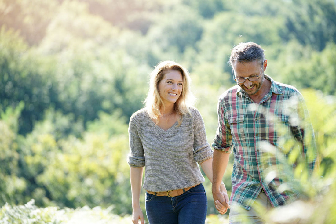 Adults enjoying an active lifestyle outdoors as part of healthy aging.